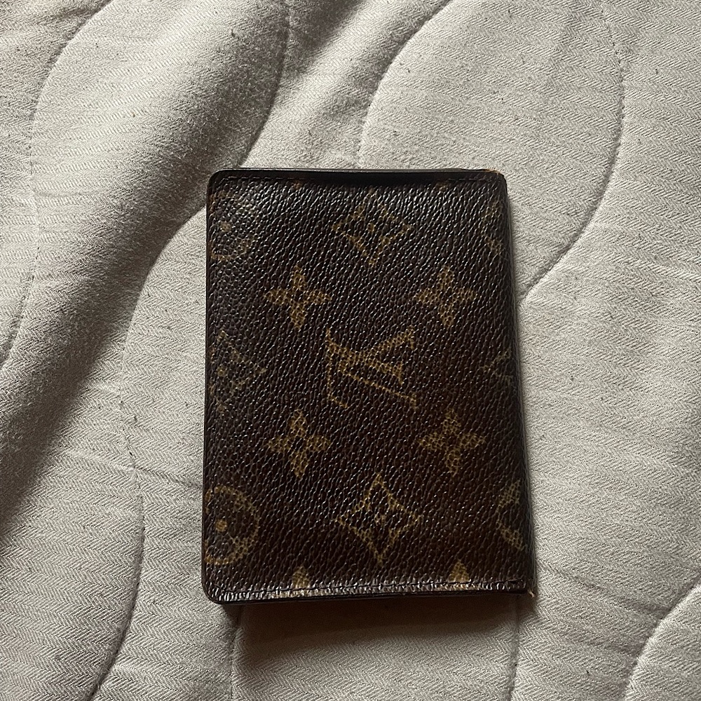 Used Monogram Louis Vuitton card holder.